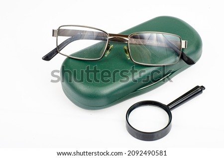 Glasses, magnifier gadgets for reading. Studio Photo