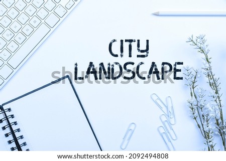 Conceptual caption City Landscape. Concept meaning photograph of the physical aspects of a city or urban area Multiple Assorted Collection Office Stationery Photo Placed Over Table