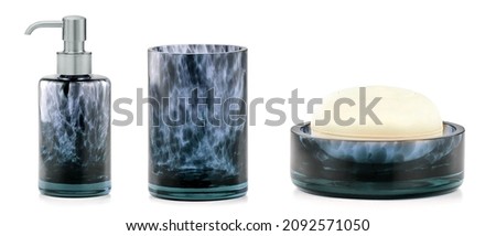 Blue ceramic accessories for bath - bowl, soap dispenser and other accessories for personal hygiene. Decor for bathroom interior, Blue And Black Bath Accessories Royalty-Free Stock Photo #2092571050
