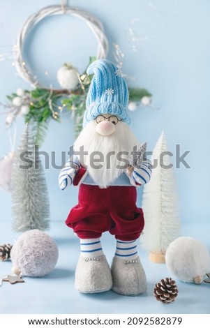 Dwarf figure in the Christmas forest