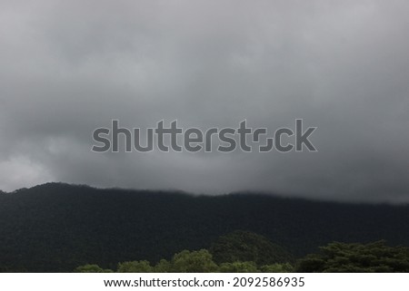 Photos of mountains or hills covered in clouds, cloudy weather photos
