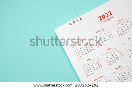 2022 calendar page on blue background business planning appointment meeting concept