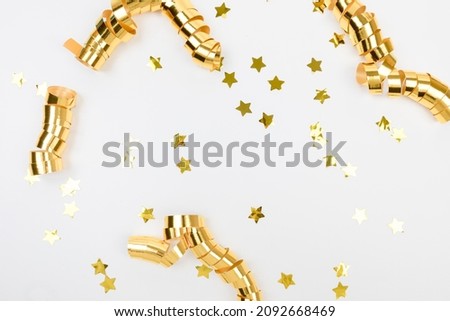 golden confetti on white background flat lay text place - Image 