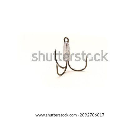 Top view large weighted snagging hook isolated on white background. Silver treble hooks fishing tackle.
