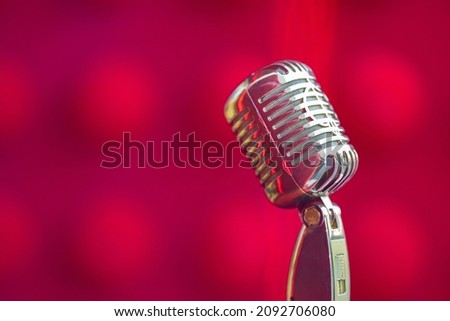 Vocal microphone on red background