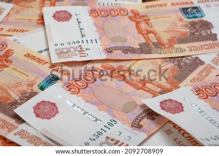 5000 rubles background. Russian banknotes at different angles.