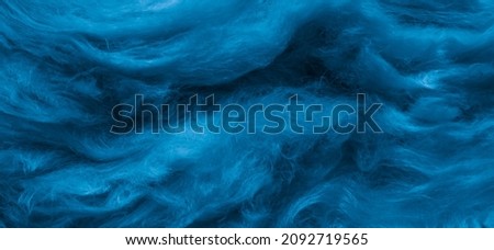 blue wool with a visible texture. background