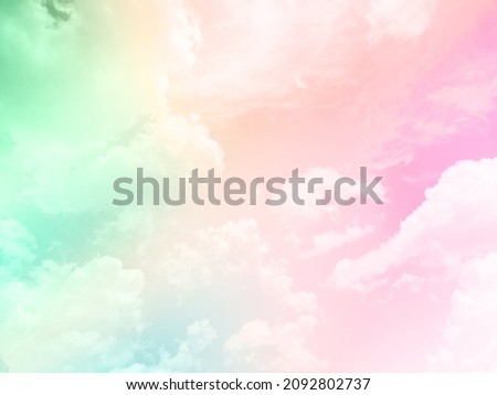 beauty sweet pastel green orange  colorful with fluffy clouds on sky. multi color rainbow image. abstract fantasy growing light