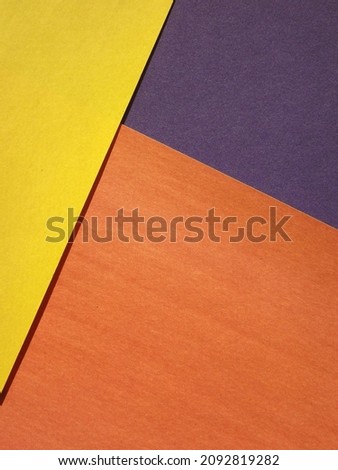 yellow, green, red, burgundy, blue, orange geometric shapes as background. High quality photo