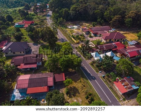 Drone shot of houses from top view which is located in Chabau, Melaka, Malaysia.
