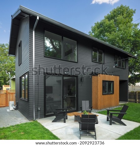 Exterior view of a modern home built to ADU specs. Royalty-Free Stock Photo #2092923736
