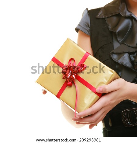 Holidays love and happiness concept - girl with golden gift box isolated