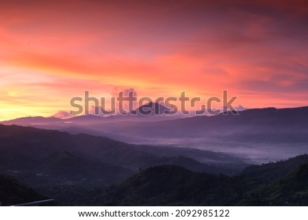 View of  mount Kerinci from a distance at dusk, in Kerinci Royalty-Free Stock Photo #2092985122
