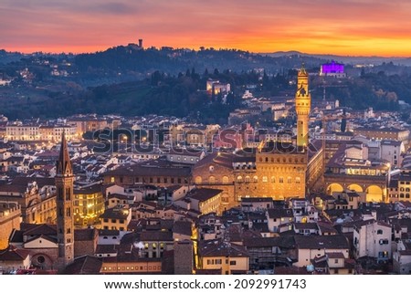 Florence, Italy aerial view at sunset with landmark old towers.