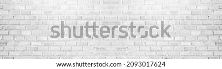 White brick wall may used as background, often around the back of buildings in cities, The file is a loop ready seamless texture file, red brick wall background with copy space. Royalty-Free Stock Photo #2093017624