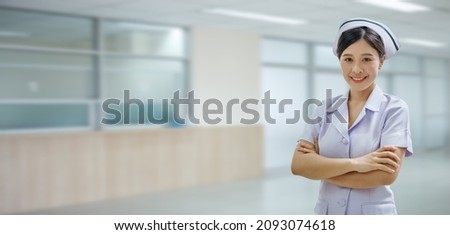 confident young asian thai nurse on indoor hospital background with copy space . banner and panoramic