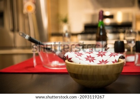 Tablecloth with wood bowl on the table