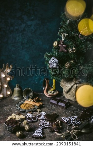 Festive moody background. The focus is on individual cookies and some objects.