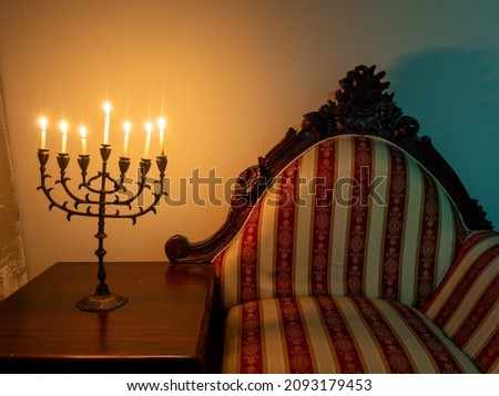 branched candelabrum lit during the eight-day Jewish holiday of Hanukkah