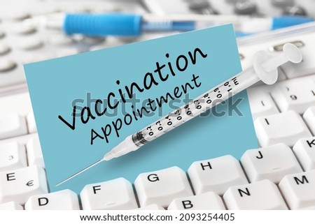 Label and vaccination appointment with PC keyboard