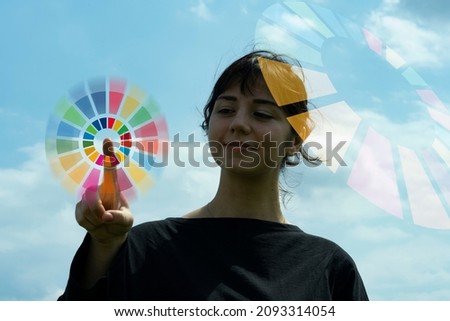 Symbol color of SDGs and silhouette of female Royalty-Free Stock Photo #2093314054