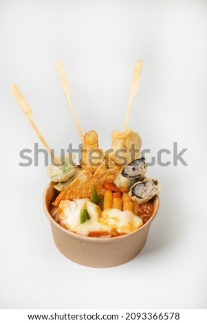 TTopoki spicy Korean sauce ,Cheese Tokpokki,Tteokbokki bowl ,Korean instant noodles soup ,on withe background