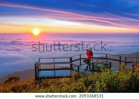 Tourist enjoying sunset at Kew Mae Pan viewpoint in Doi inthanon, Chiang Mai, Thailand. Royalty-Free Stock Photo #2093368531