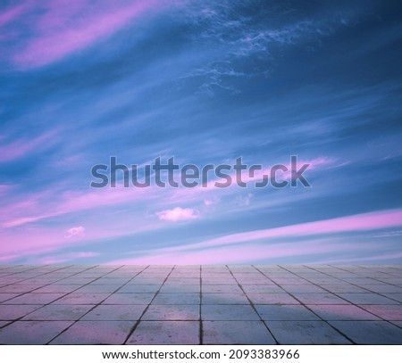 pink clouds, blue sky, gray floor. neon dramatic background.