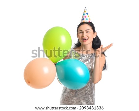 Beautiful woman with balloons on white background