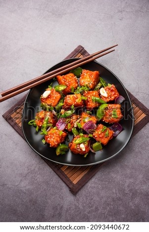 chilli paneer dry is made using cottage cheese, Indo chinese food Royalty-Free Stock Photo #2093440672