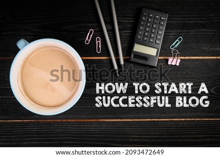 How to Start a Successful Blog. Black wooden background.