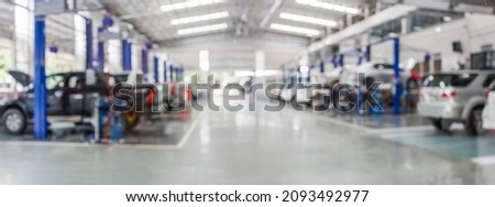 car service centre auto repair workshop blurred panoramic background Royalty-Free Stock Photo #2093492977