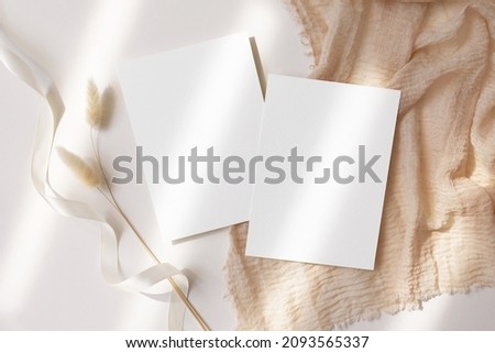 White cards 5x7 mockup with dry flowers  Royalty-Free Stock Photo #2093565337