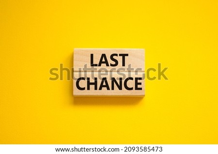 Time to last chance symbol. Concept words Last chance on wooden blocks on a beautiful yellow background. Business and time to last chance concept. Copy space. Royalty-Free Stock Photo #2093585473