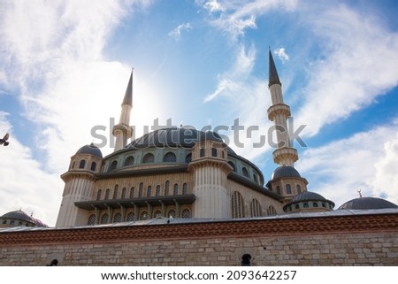 Taksim Mosque. Taksim Mosque and cloudy sky on the background. Ramadan or islamic background photo. NOISE EFFECT.