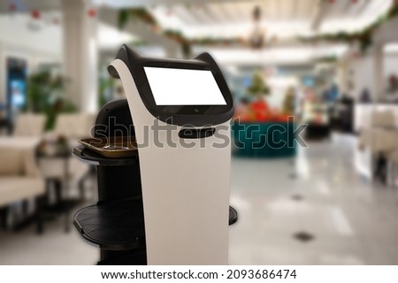 Artificial intelligence assistant personal robot for serve foods in restaurant. Robotic trend technology business concept Royalty-Free Stock Photo #2093686474