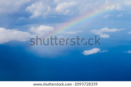 Beautiful rainbow over the Indian Ocean. Picture taken from an airplane.