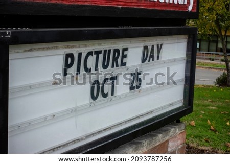 Close up view of a School Picture Day sign outside of an elemtary school in Seattle, WA