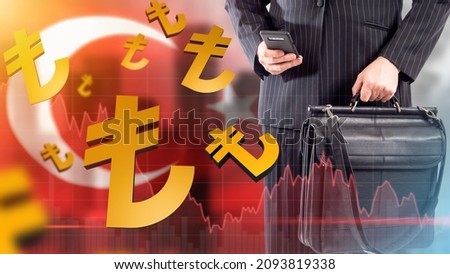 Devaluation of Turkish lira. State currency of Turkey. Falling value of Turkish currency. Devaluation fall in lira exchange rate. Money exchange rate in Turkey. Man with business briefcase and phone Royalty-Free Stock Photo #2093819338