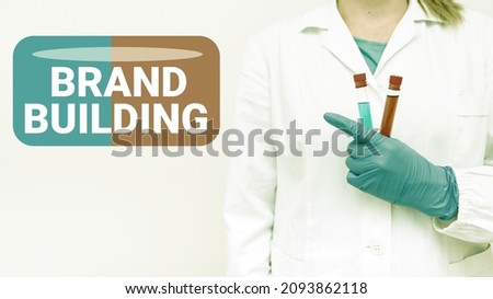 Sign displaying Brand Building. Business approach Generating awareness Establishing and promoting company Testing Medicine And Vaccine For Virus Infection Laboratory Trial Tests
