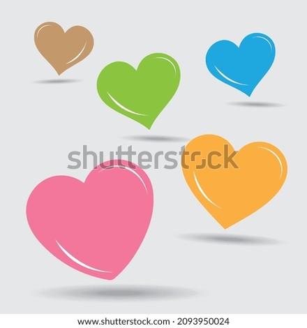 multi colored heart illustration placed on a gray background.