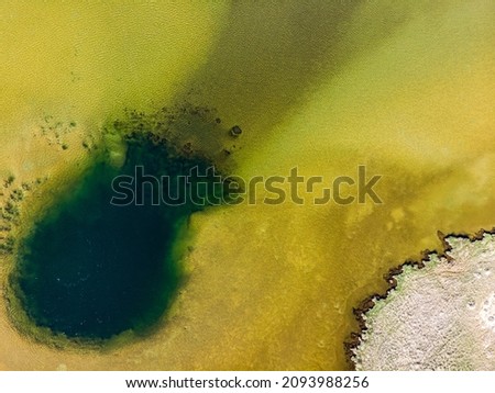 Aerial photo of a toxic Borax lake. Borax Lake is a 10-acre alkaline lake in the Alvord Desert of southeastern Oregon in the United States
