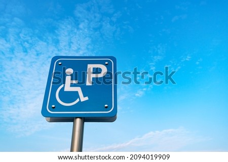 Outdoor Disabled Parking Road Sign With Sky Background