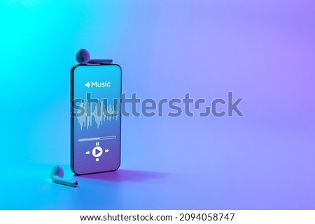Music banner. Mobile smartphone screen with music application, sound headphones. Audio voice with radio beats on neon gradient background. Broadcast media music banner with copy space