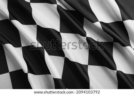 Racing checkered flag as background, top view