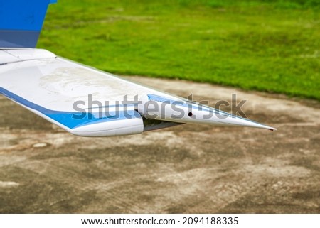 Close-up of part of the fuselage of a small aircraft Royalty-Free Stock Photo #2094188335