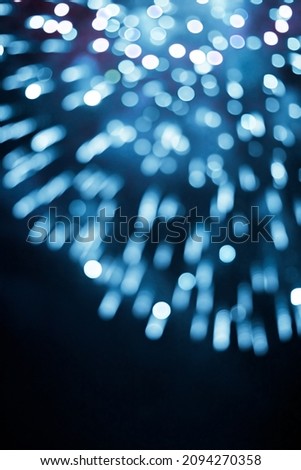 Blue Bokeh texture of festival lights background on Holidays event and happy new year