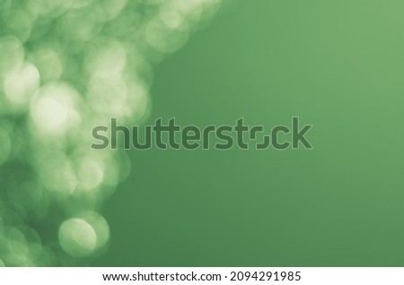 green background with defocused lights