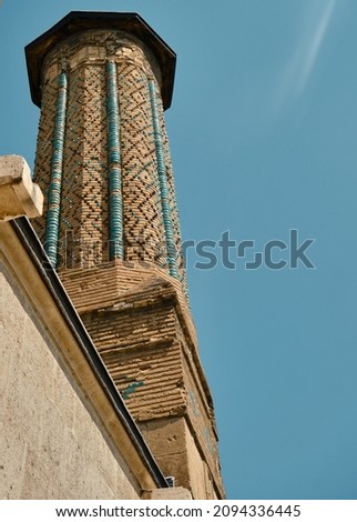 Minaret of mosque, local name is ince minareli cami, in Konya Turkey. Mosaic arts on minaret 