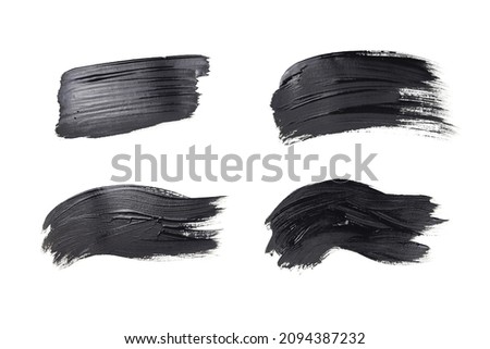 set of strokes of black paint isolated on white background Royalty-Free Stock Photo #2094387232